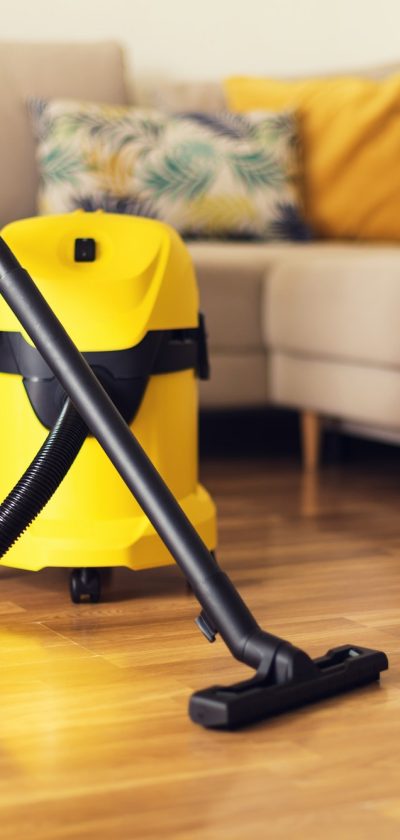 woman-cleaning-sofa-with-yellow-vacuum-cleaner-copy-space-cleaning-service-concept.jpg